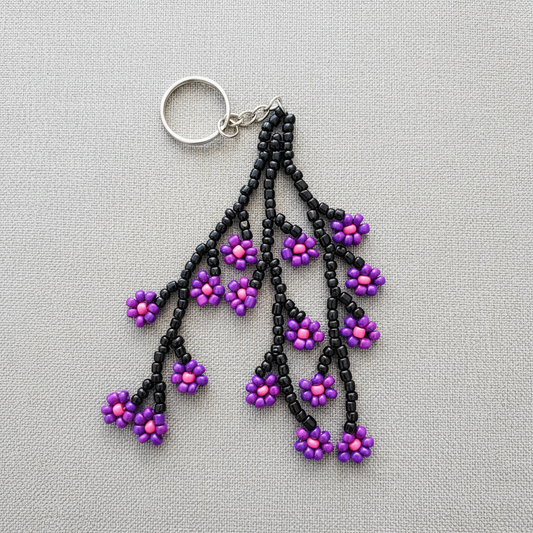 Beaded flower keychain on linen backdrop 1